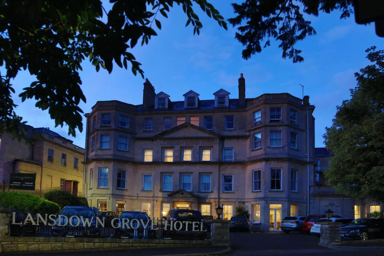 An old building with lights on in front of it at Lansdown Grove Hotel in Bath